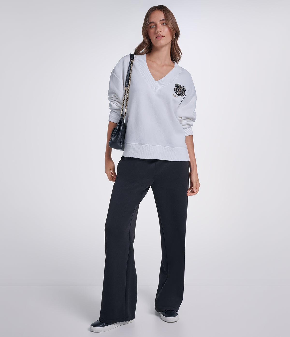 SWEATSHIRT WITH PATCHES View 1 | Holiday 2026 Collection
